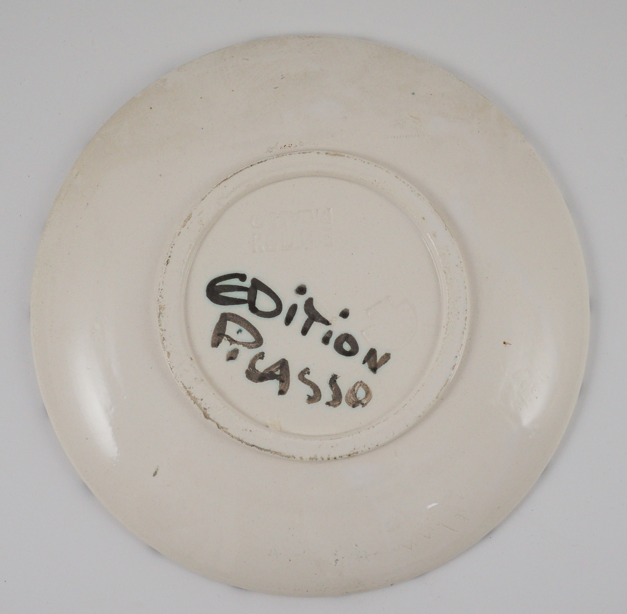 Pablo Picasso (1881-1973) for Madoura pottery, a ‘Picador’ white glazed plate, 1952, Ramie 160, 19.5cm diameter